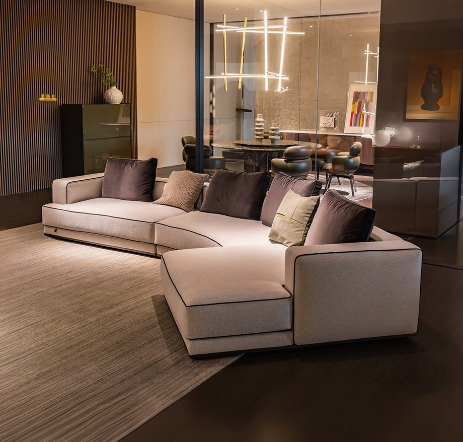 Modern minimalist interior design featuring neutral beige furniture and contemporary architectural details